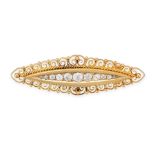 AN ANTIQUE DIAMOND BROOCH in 15ct yellow gold, the navette shaped brooch set with a row of old cu...