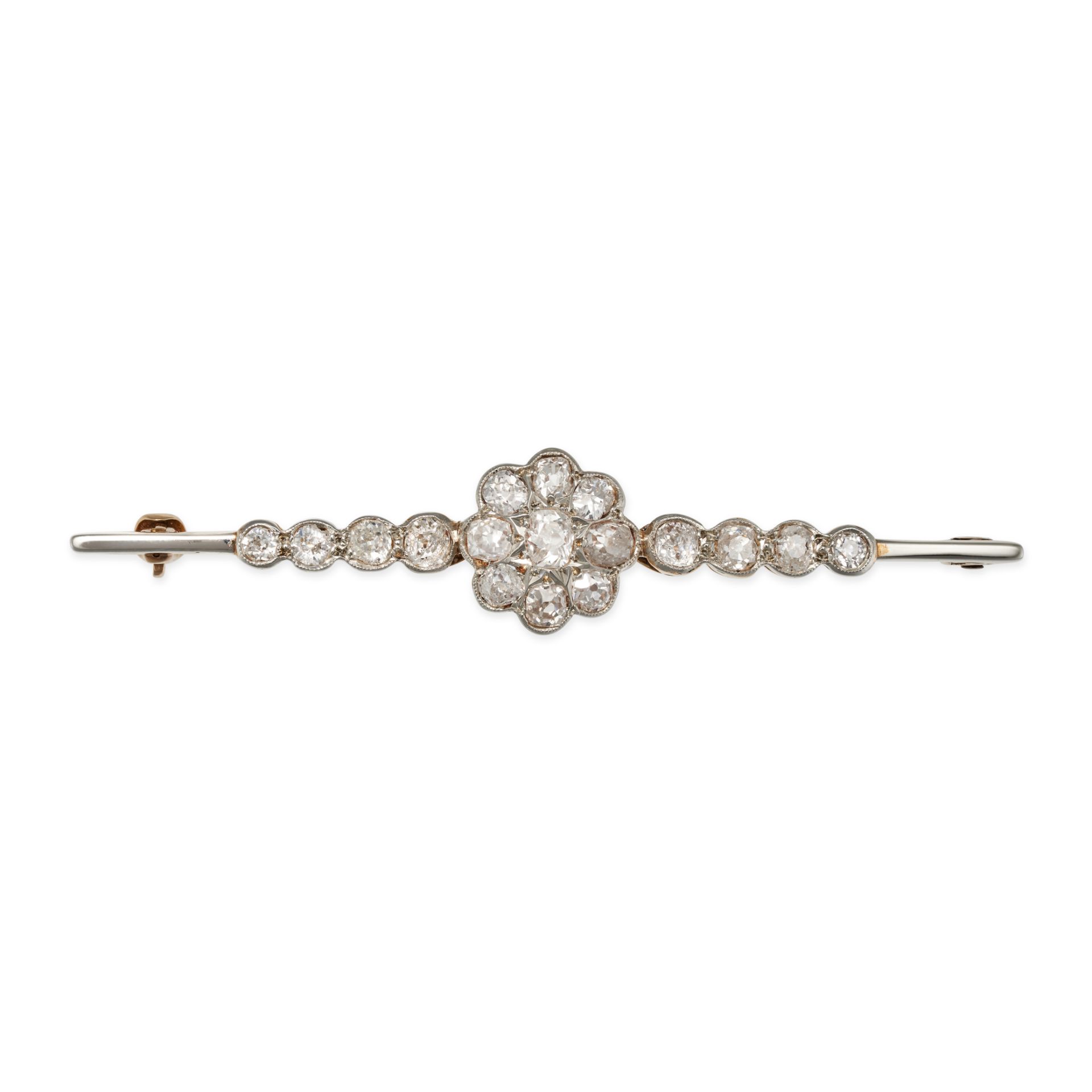 AN ANTIQUE DIAMOND BAR BROOCH in yellow gold, set with a cluster of old cut diamonds accented by ...