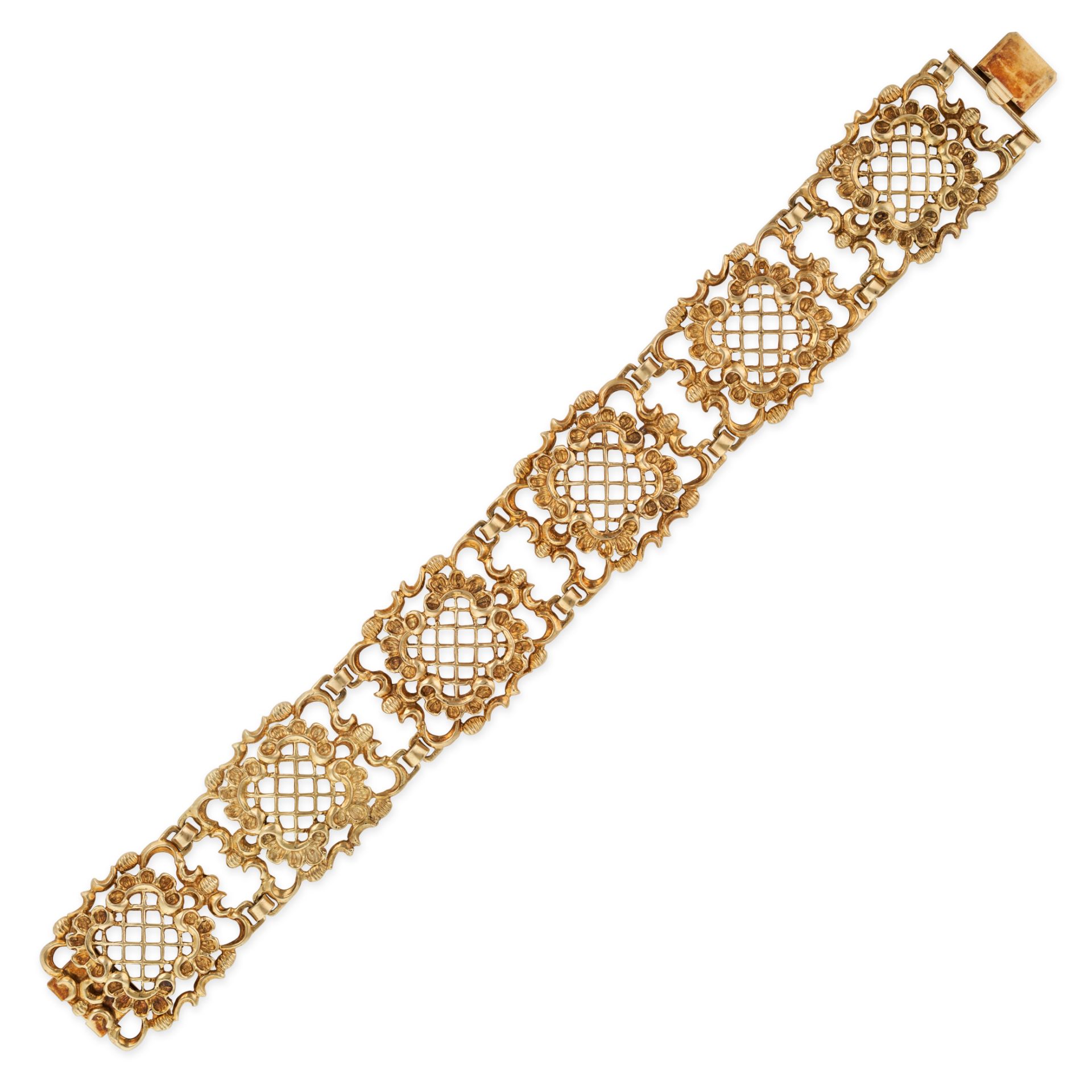 AN ANTIQUE GOLD BRACELET in 14ct yellow gold, comprising six openwork plaques with lattice and fo...