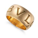 BULGARI, A MONOLOGO RING the wide band engraved BVLGARI, Italian assay marks, stamped 750, size J...