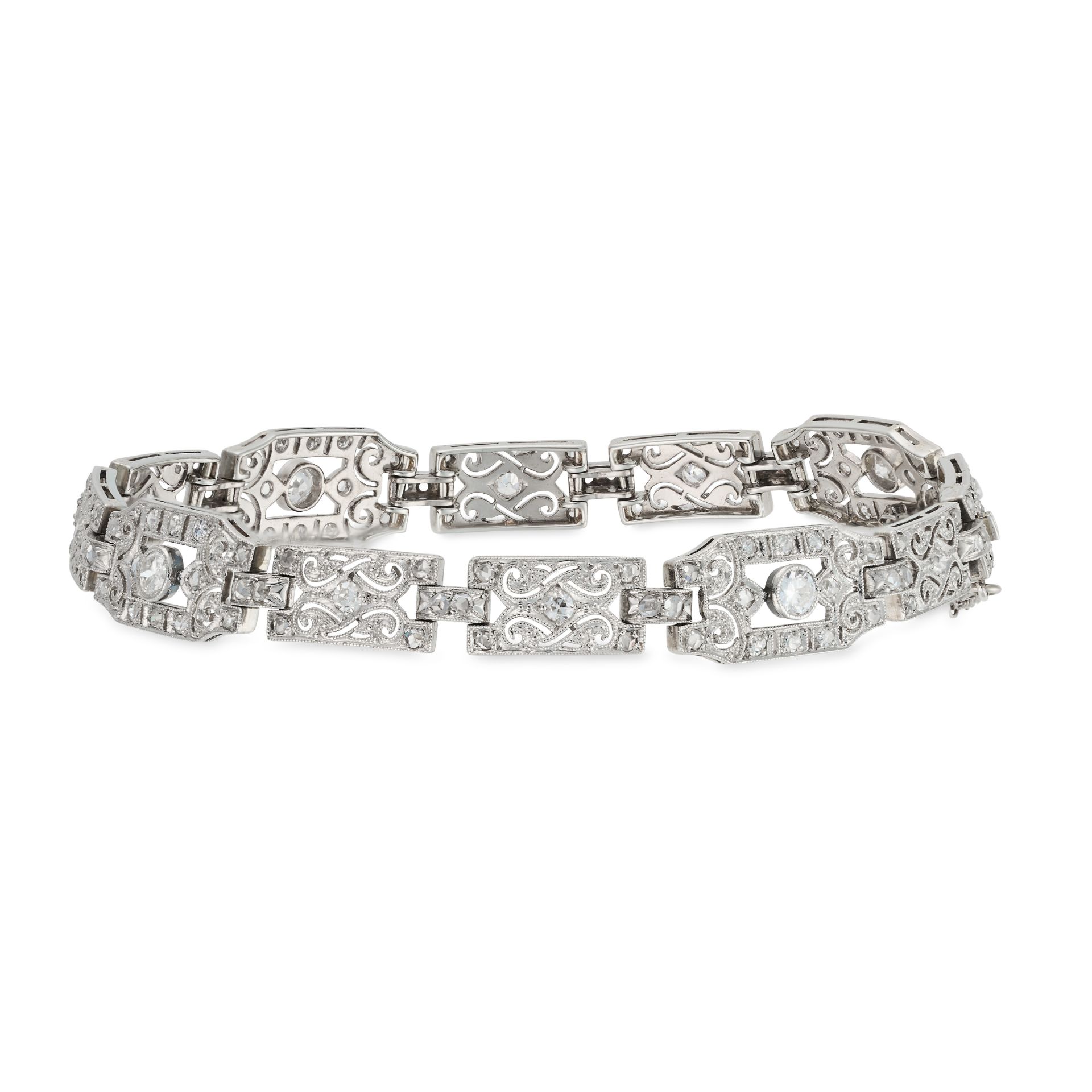 A DIAMOND BRACELET comprising geometric openwork links set throughout with round brilliant cut di...