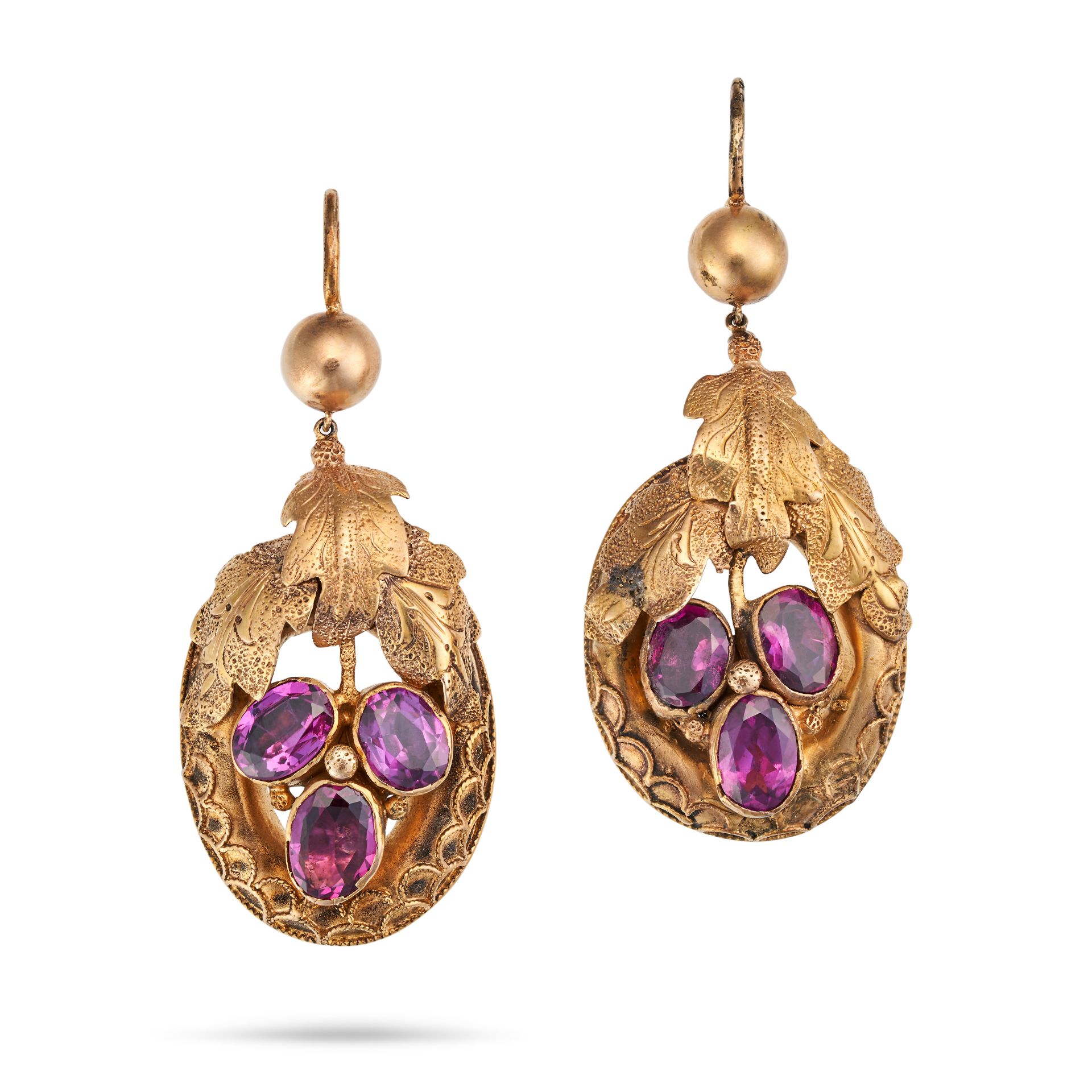 A PAIR OF ANTIQUE GARNET DROP EARRINGS each in foliate design set with a cluster of oval cut garn...