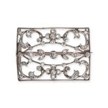 AN ANTIQUE DIAMOND PLAQUE BROOCH in yellow gold and silver, the rectangular openwork brooch set w...