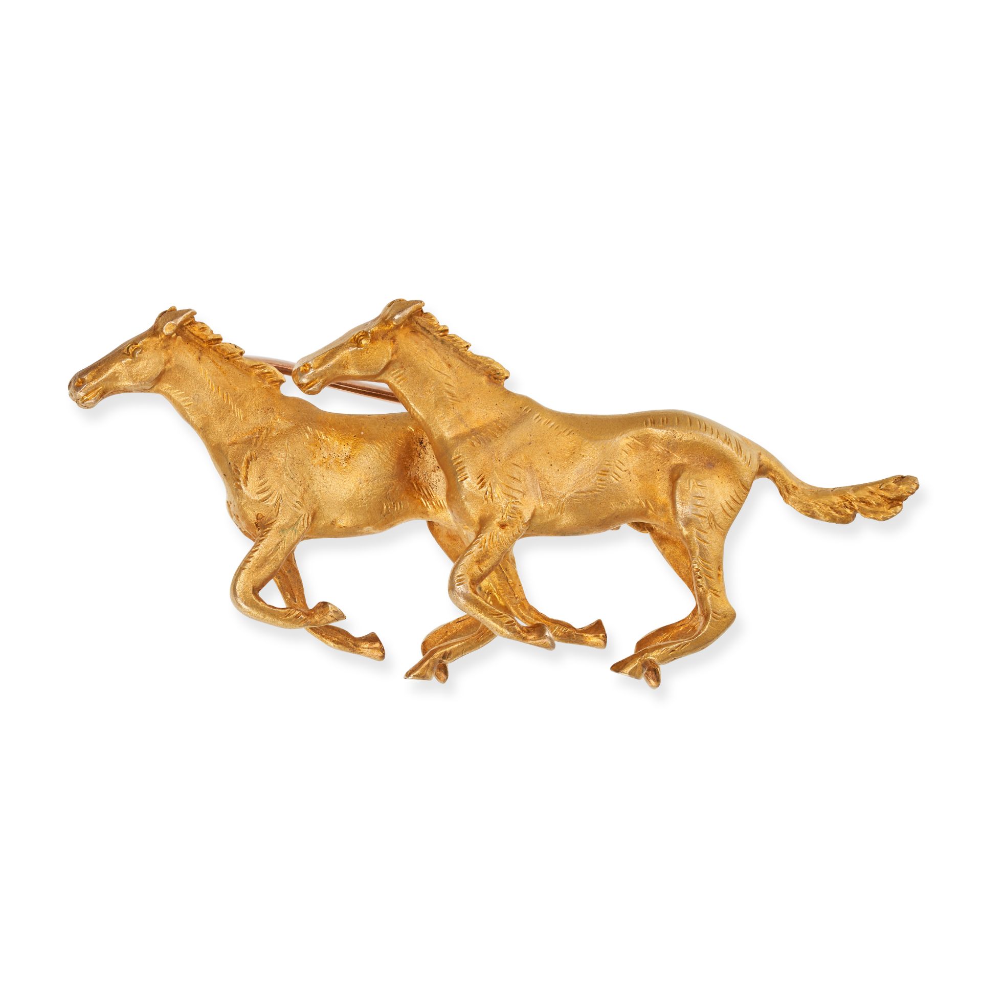 A GOLD HORSE BROOCH in 9ct yellow gold, designed as two galloping horses, full British hallmarks,...