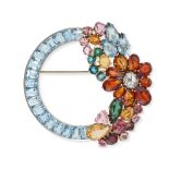 A MULTIGEM CIRCLE BROOCH the circular brooch set with a row of calibre cut aquamarines, accented ...