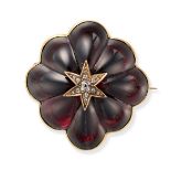 AN ANTIQUE GARNET AND DIAMOND BROOCH set with a carved cabochon garnet, with an applied star moti...