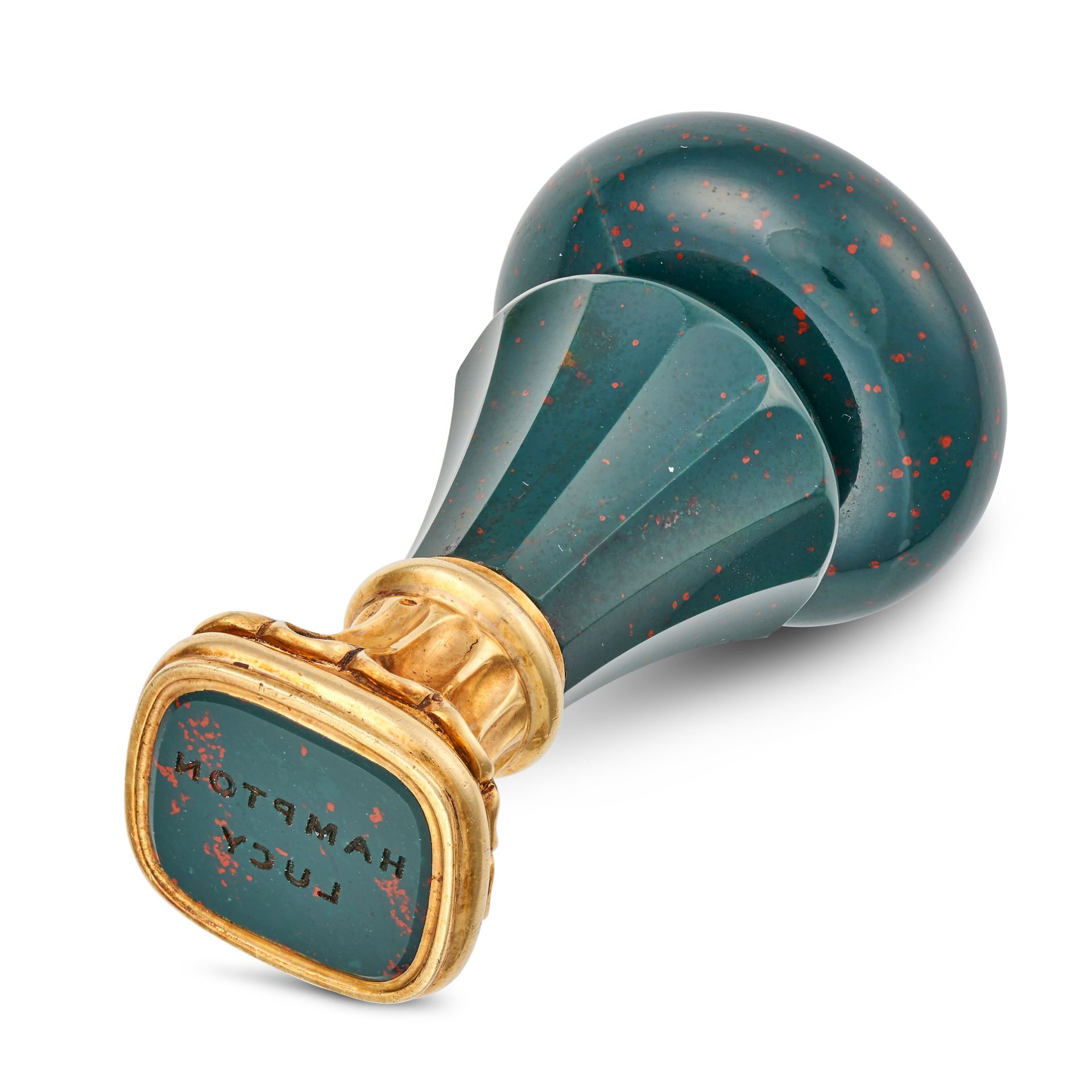 AN ANTIQUE BLOODSTONE DESK SEAL set with a bloodstone intaglio carved to read 'HAMPTON LUCY', the...