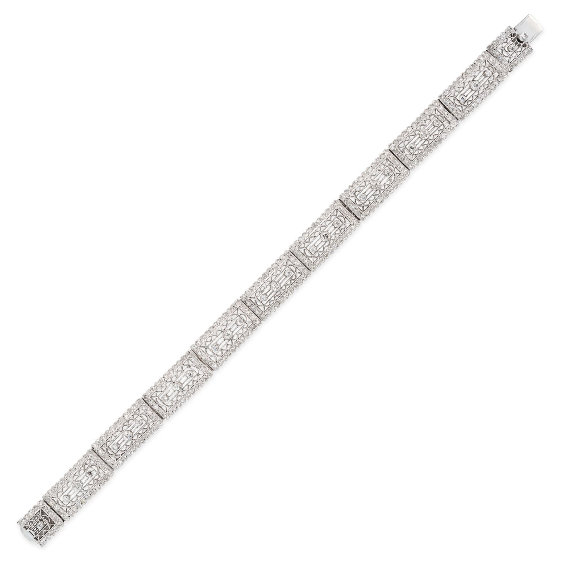 A DIAMOND BRACELET comprising ten rectangular plaques, each set with three old cut diamonds accen...