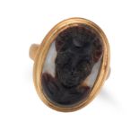 AN AGATE CAMEO RING in yellow gold, the ancient agate cameo carved to depict the bust of a man, n...
