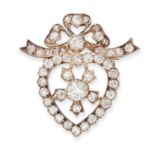 AN ANTIQUE DIAMOND BROOCH in yellow gold and silver, designed as an open heart set to the centre ...