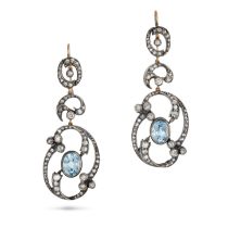 A PAIR OF AQUAMARINE AND DIAMOND DROP EARRINGS in yellow gold and silver, the scrolling openwork ...