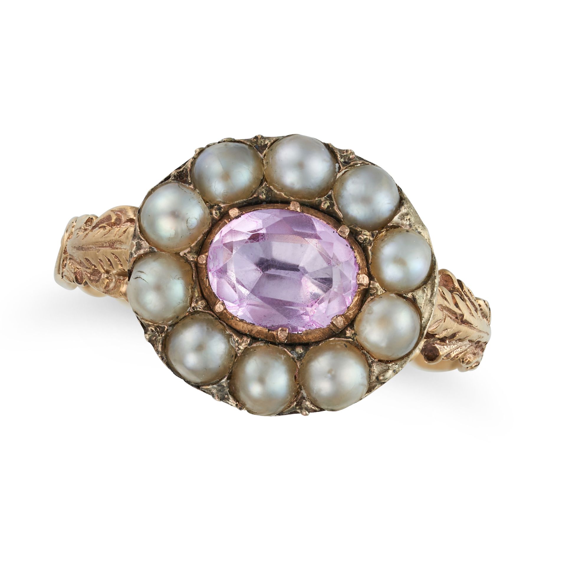 AN ANTIQUE PINK TOPAZ AND PEARL CLUSTER RING in yellow gold, set with an oval cut pink topaz in a...