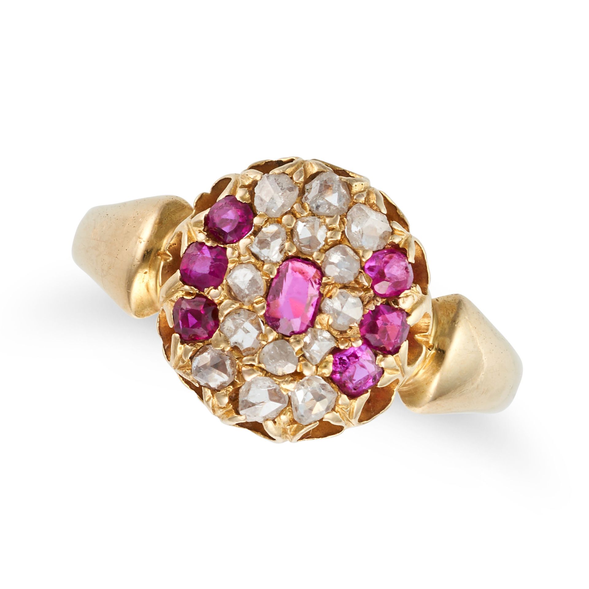 AN ANTIQUE RUBY AND DIAMOND CLUSTER RING in yellow gold, set with a cushion cut ruby in a cluster...
