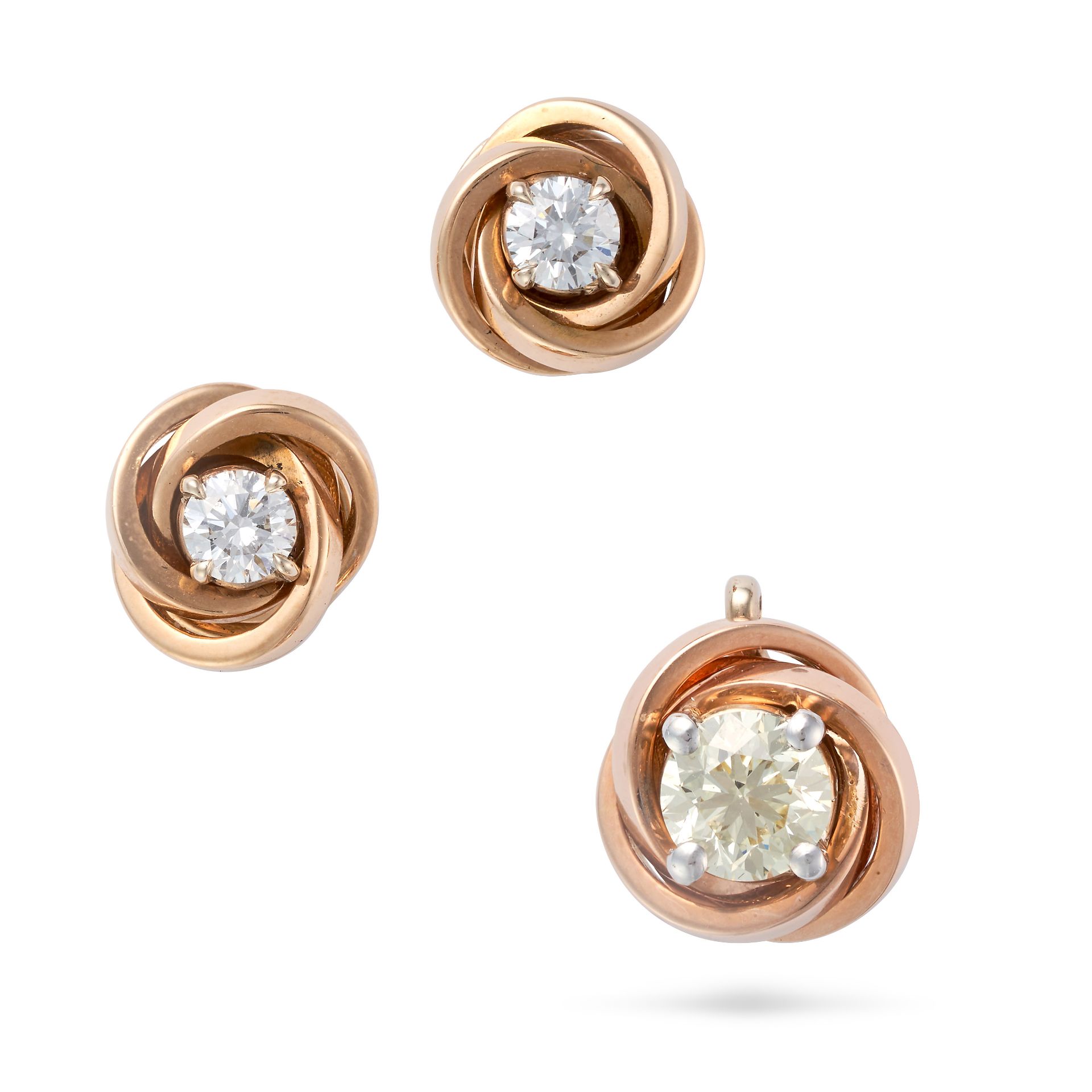 A DIAMOND PENDANT AND EARRINGS SUITE the pendant set with a round brilliant cut diamond in a twis...