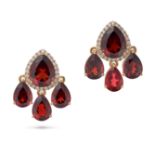 A PAIR OF GARNET AND DIAMOND DROP EARRINGS each set with a pear cut garnet in a border of round b...