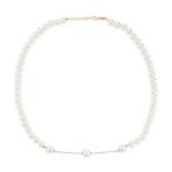 A PEARL NECKLACE comprising a single row of pearls, the central section connected by a length of ...