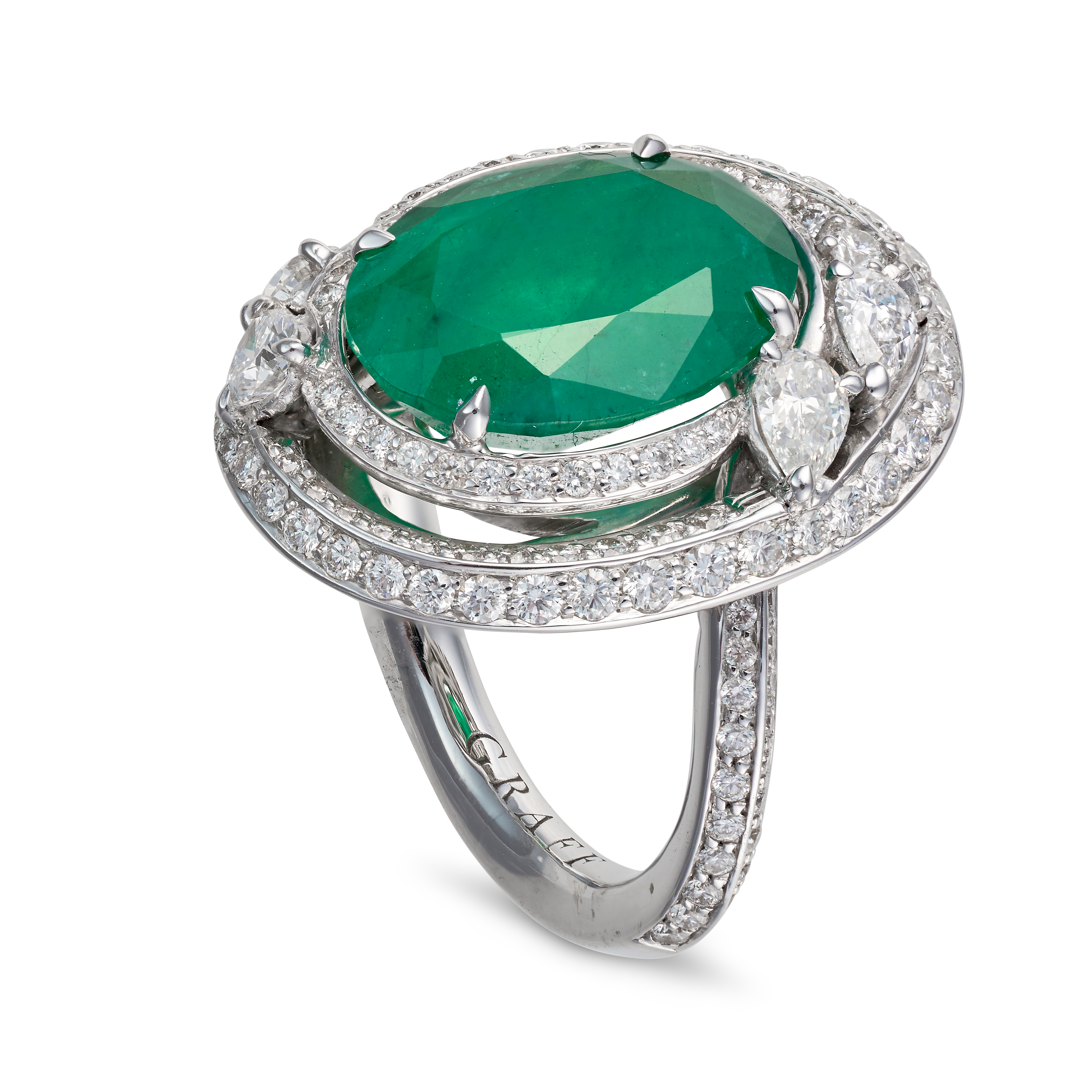 GRAFF, AN EMERALD AND DIAMOND DRESS RING set with an oval cut emerald of 7.18 carats, in a border... - Image 2 of 2
