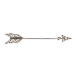 NO RESERVE - AN ANTIQUE ONYX AND PASTE JABOT PIN BROOCH designed as an arrow, the head and tail s...