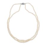 NO RESERVE - A TWO ROW PEARL AND DIAMOND NECKLACE comprising two rows of graduating pearls rangin...
