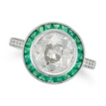 AN EMERALD AND DIAMOND TARGET RING set with an old cut diamond of approximately 2.79 carats in a ...