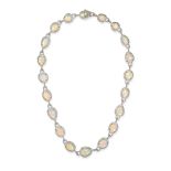 NO RESERVE - AN OPAL AND DIAMOND NECKLACE comprising a row of twenty rose cut opals in borders of...