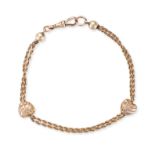 AN ANTIQUE GOLD HEART BRACELET in 9ct yellow gold, comprising two rope chains accented by two eng...