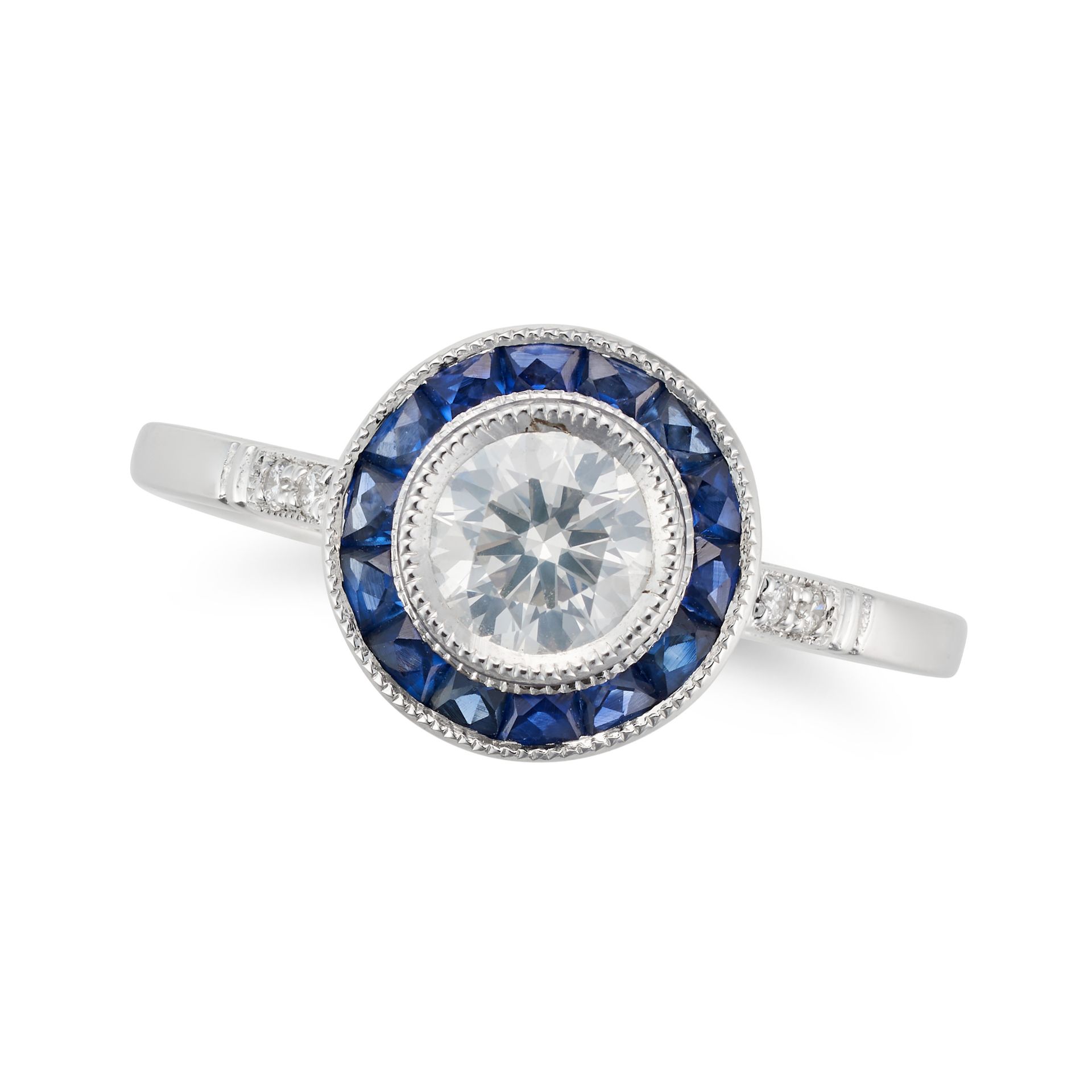 A DIAMOND AND SAPPHIRE TARGET RING set with a round brilliant cut diamond of approximately 0.45 c...