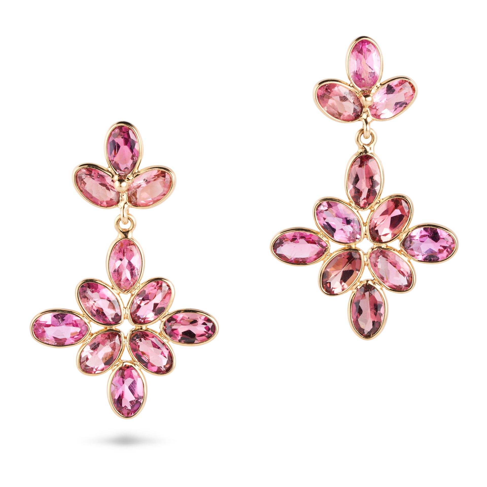 A PAIR OF PINK TOURMALINE DROP EARRINGS each set with a trio of oval cut pink tourmalines, suspen...