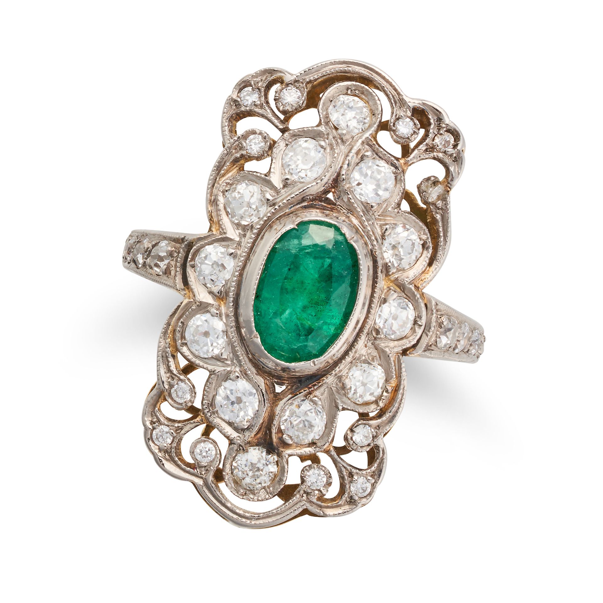 AN EMERALD AND DIAMOND DRESS RING the openwork face set with an oval cut emerald accented by old ...