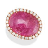 A GLASS-FILLED RUBY AND DIAMOND RING set with a rose cut glass-filled ruby in a border of round b...