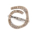 ILEANA MAKRI, A COGNAC DIAMOND DRESS RING the circular ring set with round cut cognac diamonds, s...