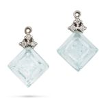 A PAIR OF AQUAMARINE AND DIAMOND EAR JACKETS each set with a carved aquamarine drop accented by r...