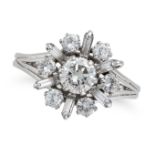 A DIAMOND CLUSTER RING set with a round brilliant cut diamond in a cluster of baguette and round ...