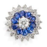 A DIAMOND AND SAPPHIRE CLUSTER RING in 18ct white gold, set to the centre with a round brilliant ...