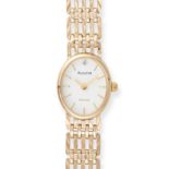 NO RESERVE - ACCURIST, A LADIES WRISTWATCH in 9ct yellow gold, oval case surrounding a white dial...