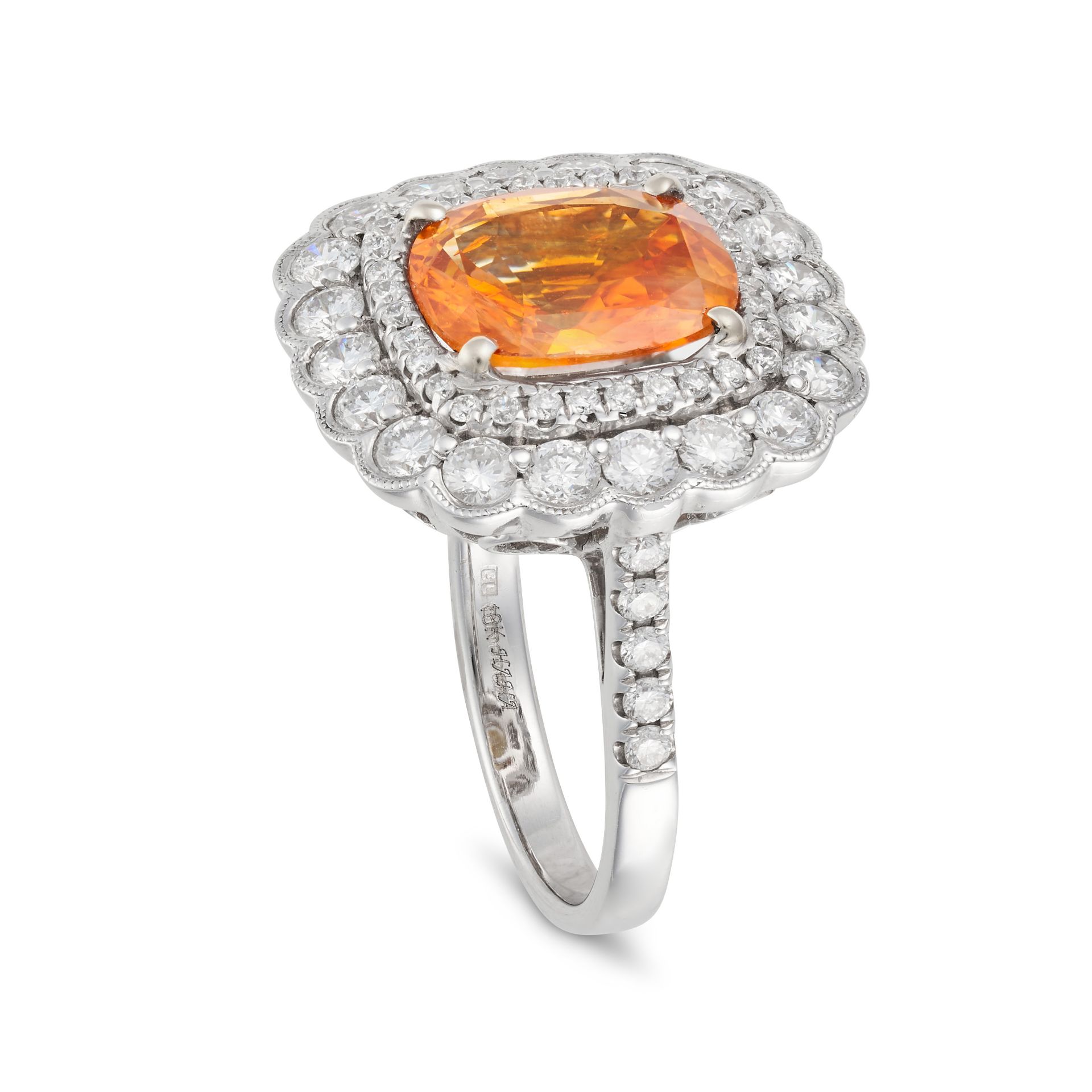 AN ORANGE SAPPHIRE AND DIAMOND CLUSTER RING in 18ct white gold, set with a cushion cut orange sap... - Image 2 of 2