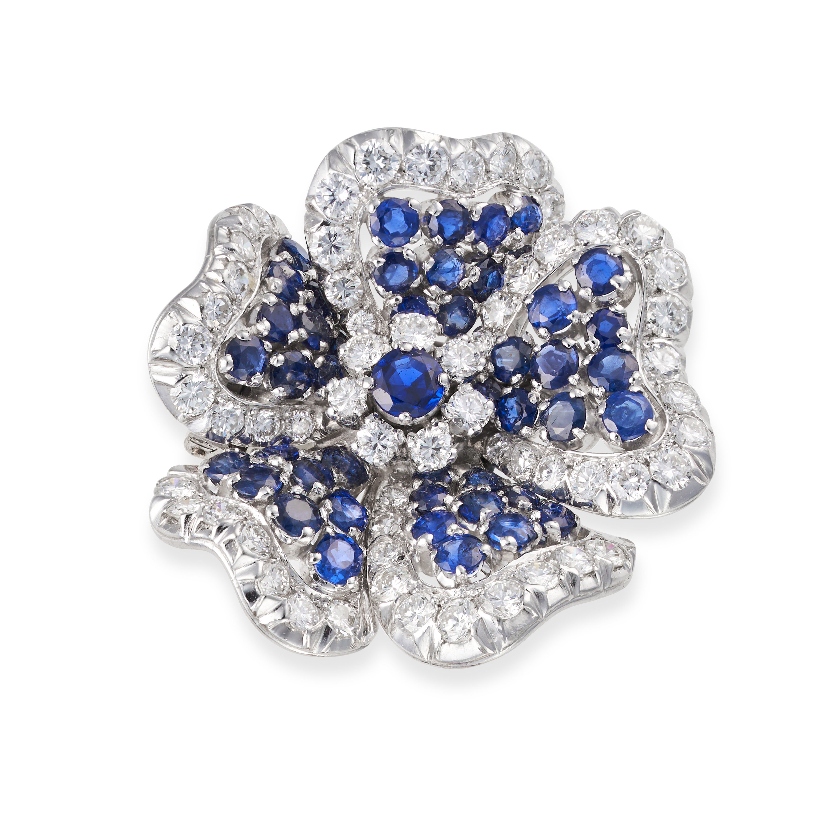 A SAPPHIRE AND DIAMOND FLOWER BROOCH set to the centre with a round cut sapphire in a cluster of ...