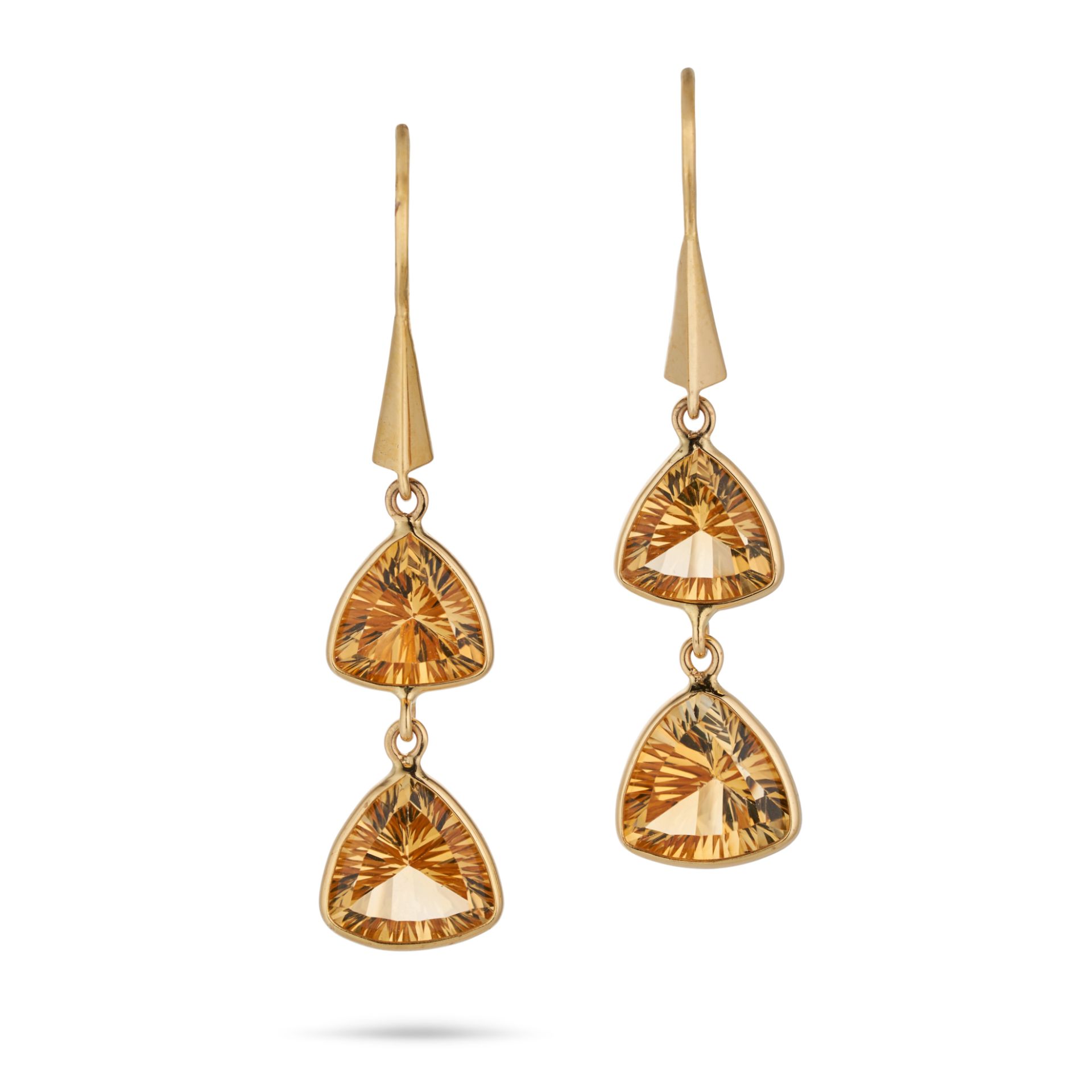 A PAIR OF CITRINE DROP EARRINGS each suspending two fancy cut citrines, stamped 18K, 4.3cm, 3.4g.