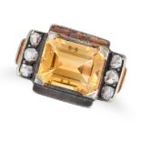 A RETRO CITRINE AND DIAMOND RING in yellow gold and silver, set with an octagonal step cut citrin...