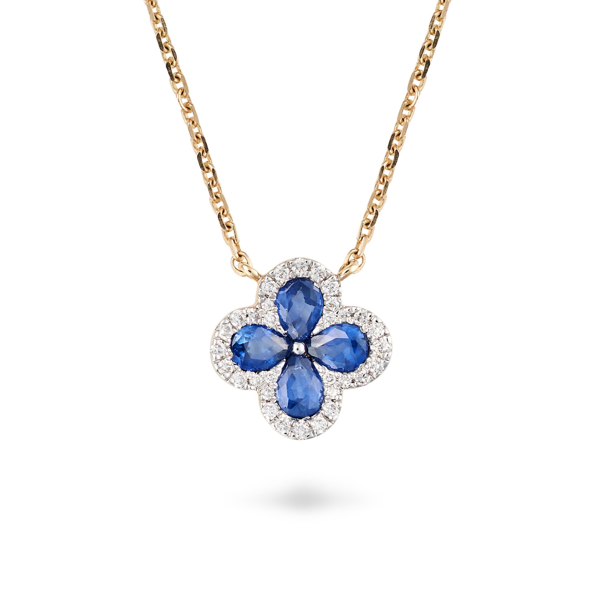 A SAPPHIRE AND DIAMOND FLOWER PENDANT NECKLACE the pendant designed as a flower set with pear cut...