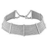 ADLER, A DIAMOND CHOKER NECKLACE comprising sixteen rows of wirework accented by five panels set ...