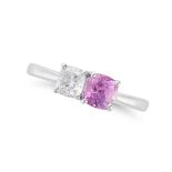 A PINK SAPPHIRE AND DIAMOND RING in platinum, set with a cushion cut pink sapphire of 1.03 carats...