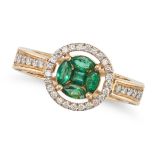 AN EMERALD AND DIAMOND RING / PENDANT set with a cluster of variously cut emeralds in a halo of r...