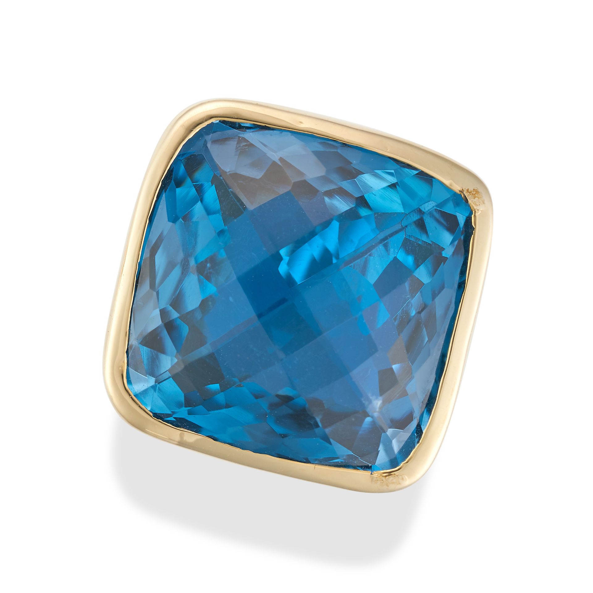 A BLUE TOPAZ AND DIAMOND RING set with a fancy cut blue topaz of 37.60 carats, the shoulders set ...
