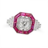 A DIAMOND AND RUBY TARGET RING set with an old cut diamond of 0.99 carats in a border of calibre ...