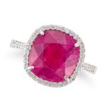 A PINK TOURMALINE AND DIAMOND RING set with a cushion cut pink tourmaline of 5.03 carats in a bor...