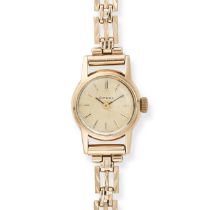 NO RESERVE - OMEGA, A LADIES WRISTWATCH in 9ct yellow gold, circular case surrounding a champagne...