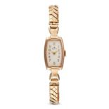 ROLEX, A VINTAGE LADIES WRISTWATCH in 9ct yellow gold, a tonneau shaped case surrounding white di...