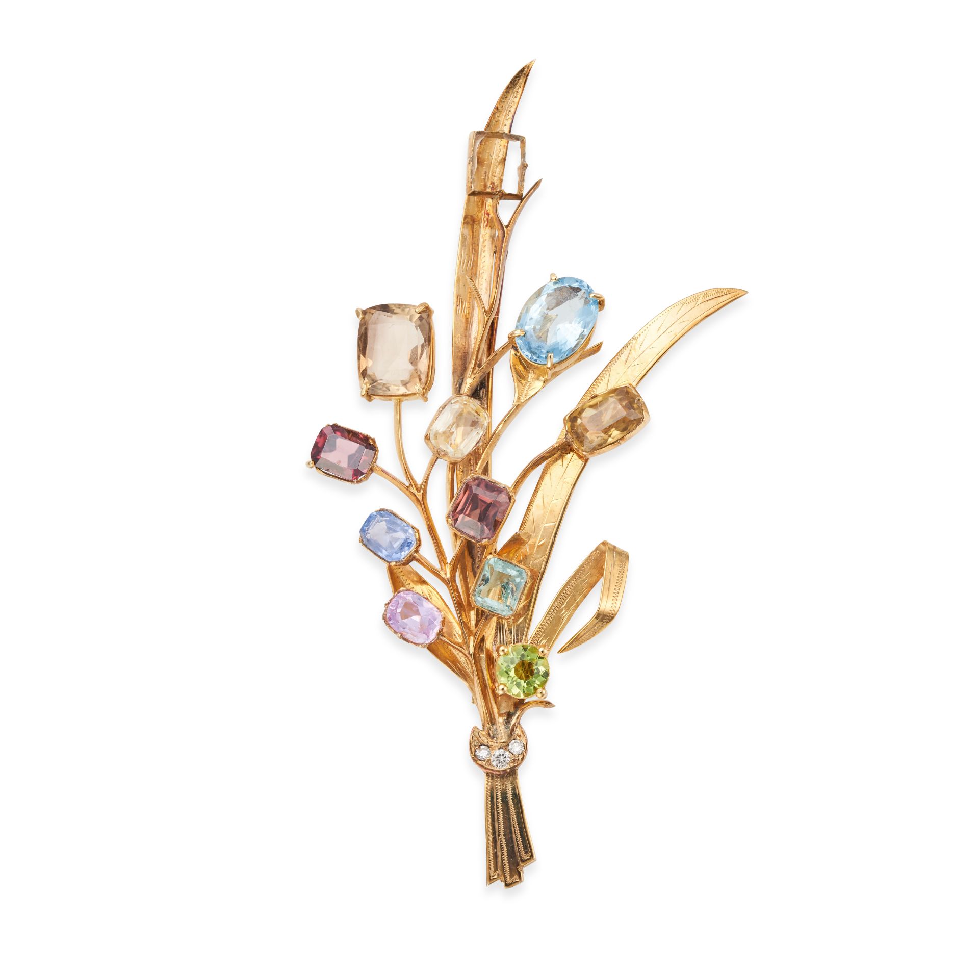 A VINTAGE GEMSET SPRAY BROOCH in yellow gold, designed as a spray of foliage set with yellow, pin...