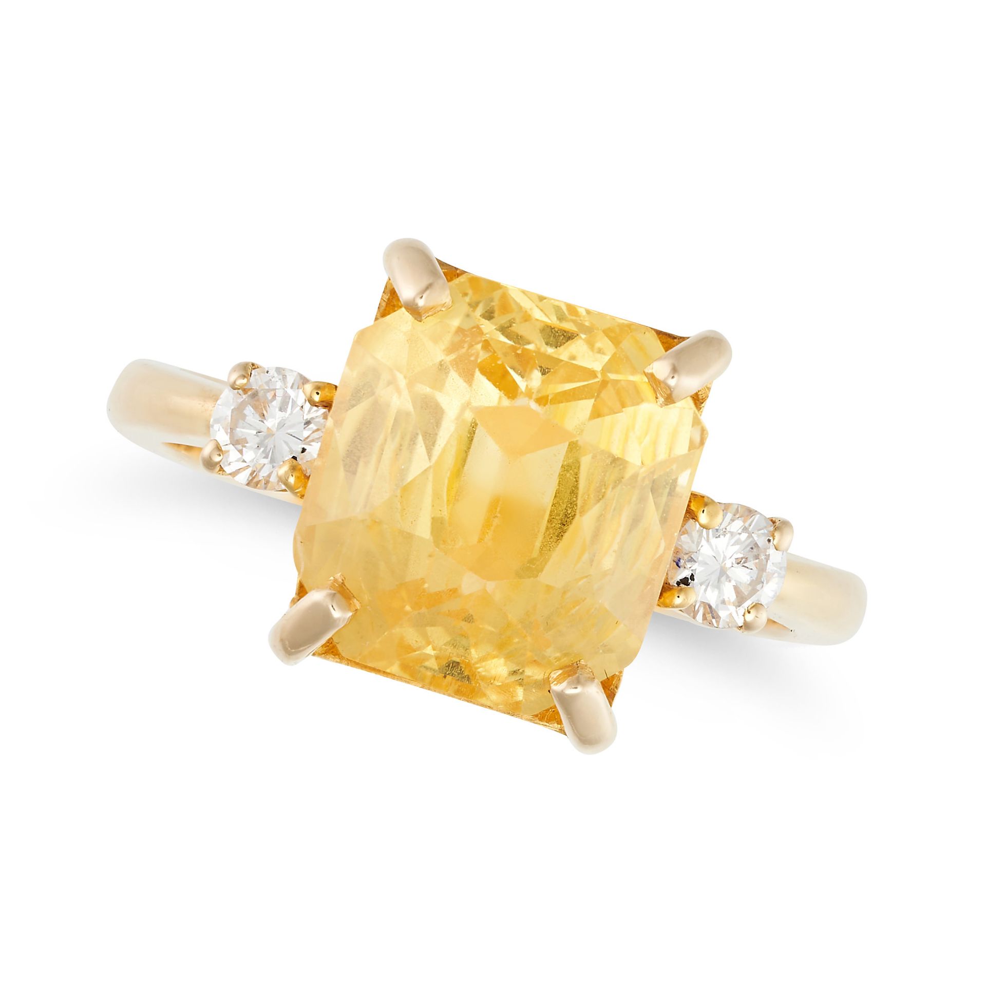 A CEYLON NO HEAT YELLOW SAPPHIRE AND DIAMOND THREE STONE RING set with a fancy cut yellow sapphir...